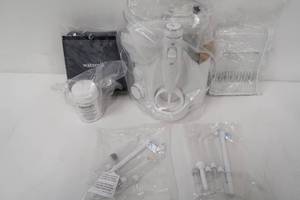 lot 613 image: Waterpik Ultra Plus and Cordless Select Water Flosser Combo