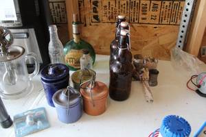lot 87 image: Lot of (Approximately 12) Collectible Bottles, Brown Bottles with Flip Top, Flip Top Containers and Shot Glasses