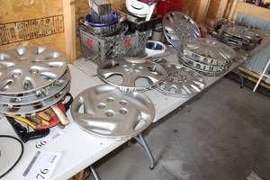 lot 76 image: Lot of (14) Automotive Hubcaps