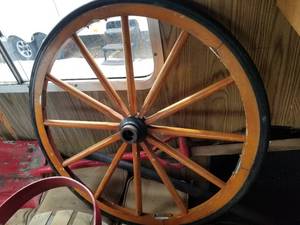 lot 61 image: Wood Wagon Wheel with Rubber Tire