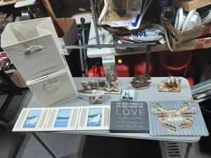 lot 31 image: Lot Of Nautical Home Decor 2-Ship Statues, 2-New Reed Diffusers, 10-Canvas Organizers, More