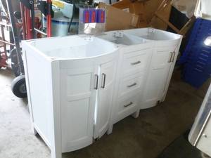 Dual Sink vanity base. New.  No sink. 59 14 x 19 14 x 33 Greentouch China Brand. As shown.