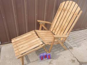 New wood lounge chair. As shown.