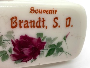 lot 192 image: Two Brandt, South Dakota Vintage Paper Weights