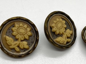 lot 334 image: Three Small Vintage Clothing Buttons