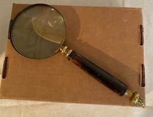 lot 413 image: Seven Magnifying Glasses