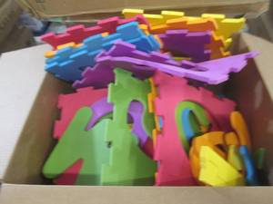 lot 38 image: box of foam pads with numbers and t...