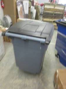 lot 204 image: trash can missing wheels with small...