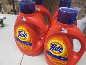 lot 208 image: 4 bottles of tide 1 has some missin...