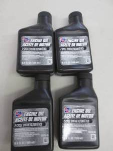 lot 261 image: 4 carquest 2-cycle synthetic 6.4flo...
