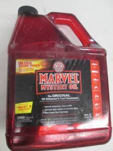 lot 293 image: 1 gallon of marvel mystery oil ...