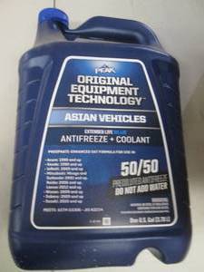 lot 301 image: 1 gallon of peak asian blue antifre...