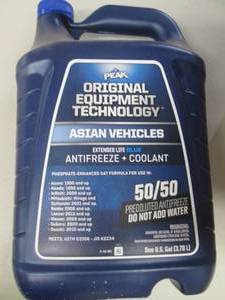 lot 303 image: 1 gallon of peak asian blue antifre...