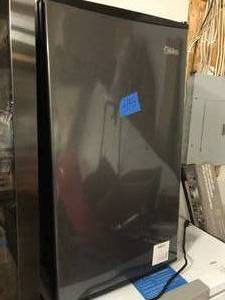 lot 45 image: Midea MRM33S7ASL Midea 3.3 cut.ft Compact Refrigerator.