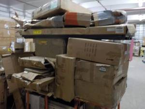 Pallet of Parts and Returns cart n...