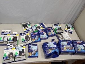 lot 132 image: Assorted Garage Door Remotes, Sensors, Keypads, Etc