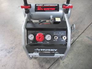 lot 12 image: Husky 4.5 Gal. Portable Electric-Powered Silent Air Compressor 3320445