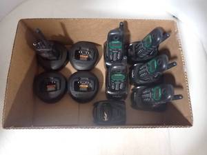lot 13 image: Assorted walkie talkies and charging stations, Includes 2 different brands of radios, power tested only 