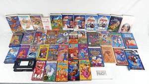 lot 54 image: Lot of 41 Vintage VHS Movies - Most Are Promotional Screening Tapes - Mainly Family and Kid Friendly Comedy Movies