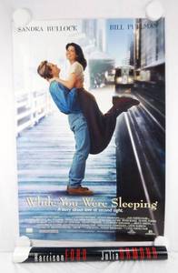 lot 15 image: Vintage 1995 While You Were Sleeping Original and 1995 Sabrina Advance Double Sided Original Movie Theater Poster Set