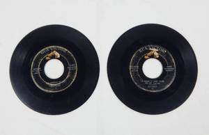 lot 102 image: Set of 2 Extremely Rare Vintage 1956 RCA Victor Elvis Presley 45 Records