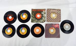 lot 109 image: Lot of 9 Vintage 1970s and 1980s Rock and Roll and Pop 45 Records