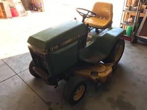 lot 2 image: John Deere 316 Riding Lawnmower