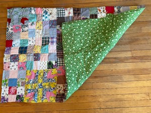 Small Handmade Quilt with a Floral Backing