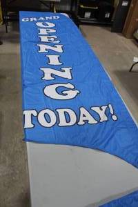 lot 1267 image: Lot of (2) Roadside Flags - Grand Opening Today 31x110, Blue 32x120