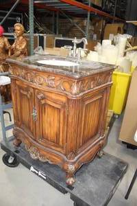 lot 1424 image: Ornate Wood Marble Top Bathroom Sink Cabinet with Sink and Fixtures 2-door 31Wx22Dx35H