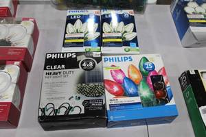 lot 1287 image: Lot of (4) Philips IndoorOutdoor Lighting - C9 Warm White 25-bulb (2 boxes), C9 Icy Crystal Twinkling Multi-Color 25-bulb (1 box), Heavy Duty Net Light Set Clear 200-Light 18GA 4x8 (x1) (in box)