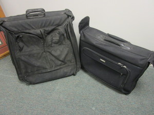 TUMI AND FORECAST ROLLING GARMENT BAGS