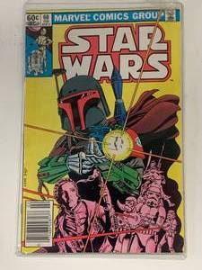 lot 32 image: 1983 Star Wars Comic Book #68 First AppearanceOfMandalorian (A 9.8 Sold For $2995.)
