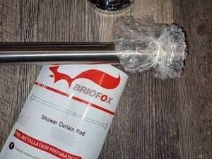 lot 101 image: New Spring Loaded Shower Rod & Towel Bar