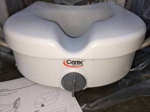 lot 129 image: Carex E-Z Lock Raised Toilet Seat