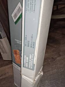 lot 24 image: Two 35 x 64  1 Cordless Vinyl Blinds