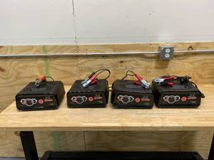 lot 25 image: SCHUMACHER Lot of 4-  Battery Extender 12-Volt, 80 Amp Engine Start, 20 Amp ChargersMaintainers