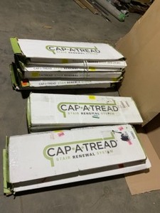 CAP A THREAD HEIGHT LAMINATE TO COVER STAIR 1 IN THICK. SEE PICTURES