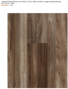 LAKESHORE PECAN BRONZE LENGTH LAMINATE FLOORING. SEE PICTURES