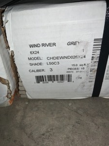 A PALLET OF FLOORING AND TILE. SEE PICTURES