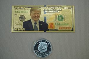 lot 41 image: Trump bill, coin
