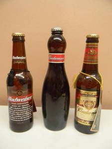 lot 19 image: VINTAGE BUDWEISER BEER SPECIAL EDITION  RARE BOTTLE COLLECTION - SOME VALUABLE - SEE PICTURES