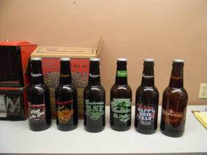 lot 21 image: 6 Collectible LARGE 15 Budweiser King of Beers Glass Beer Bottle - HALLOWEEN, HAPPY NEW YEAR & ST. PATS WITH CASE - NICE SET - SEE PICTURES