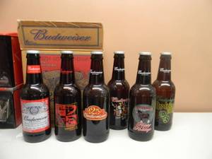 lot 32 image: 6 Collectible LARGE 15 Budweiser King of Beers Glass Beer Bottle - WILD ON BUD, 125TH ANNIVERSARY, KING OF BEERS, MARDI GRAS, LETS FIESTA,HAPPY HOLIDAYS WITH CASE - NICE SET - SEE PICTURES