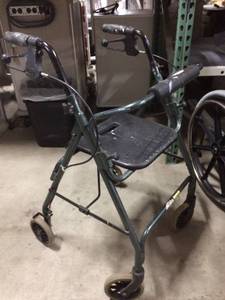 ROLLATOR WALKER - HAS SOME WEAR AND TEAR