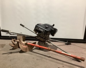 lot 7 image: Gas Powered Post Hole digger with bit