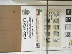 Clopay Classic Collection 8 ft. x 7 ft. Non-Insulated White Garage Door not used see pictures
