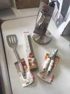 lot 22 image: Brand New Macys Cooking Utensils & Stainless Towel Holder Lot