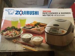 lot 1 image: Brand New Zojirushi NS-TSC10 5-12-Cup Rice Cooker and Warmer