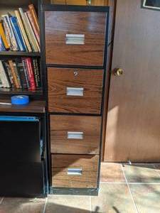 lot 165 image: Four Drawer Metal File Cabinet